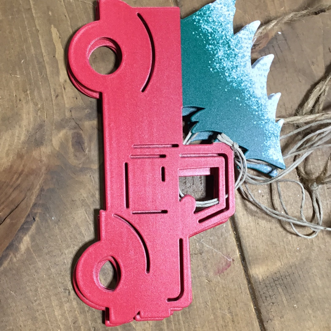 Red truck with tree garland
