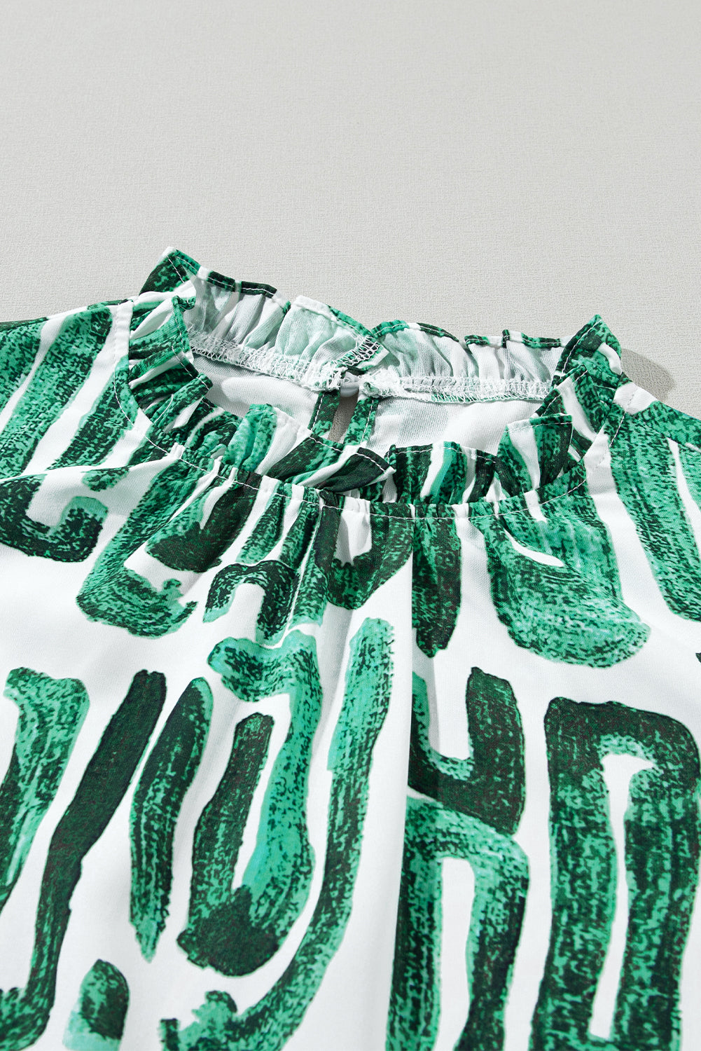 Green Embroidered Frilled Neck Printed Top