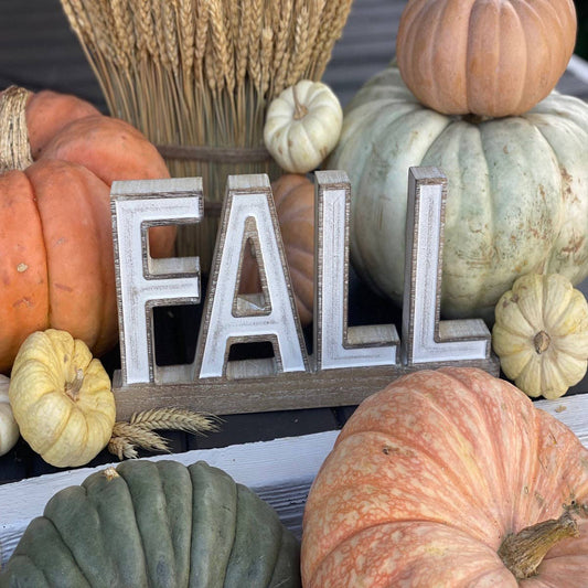 Carved FALL on Base