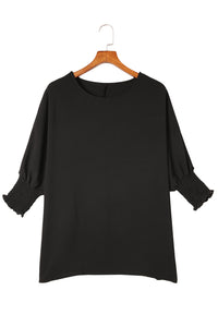 Black Smocked Wrist Shift Top
