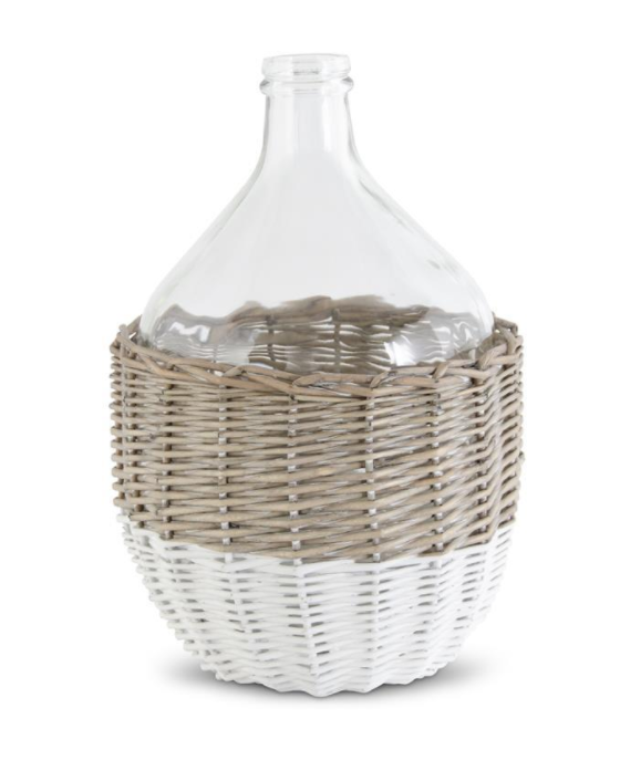 Clear Glass Bottle in White and Tan Wicker Basket